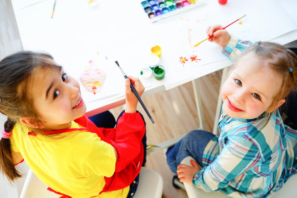 two children painting